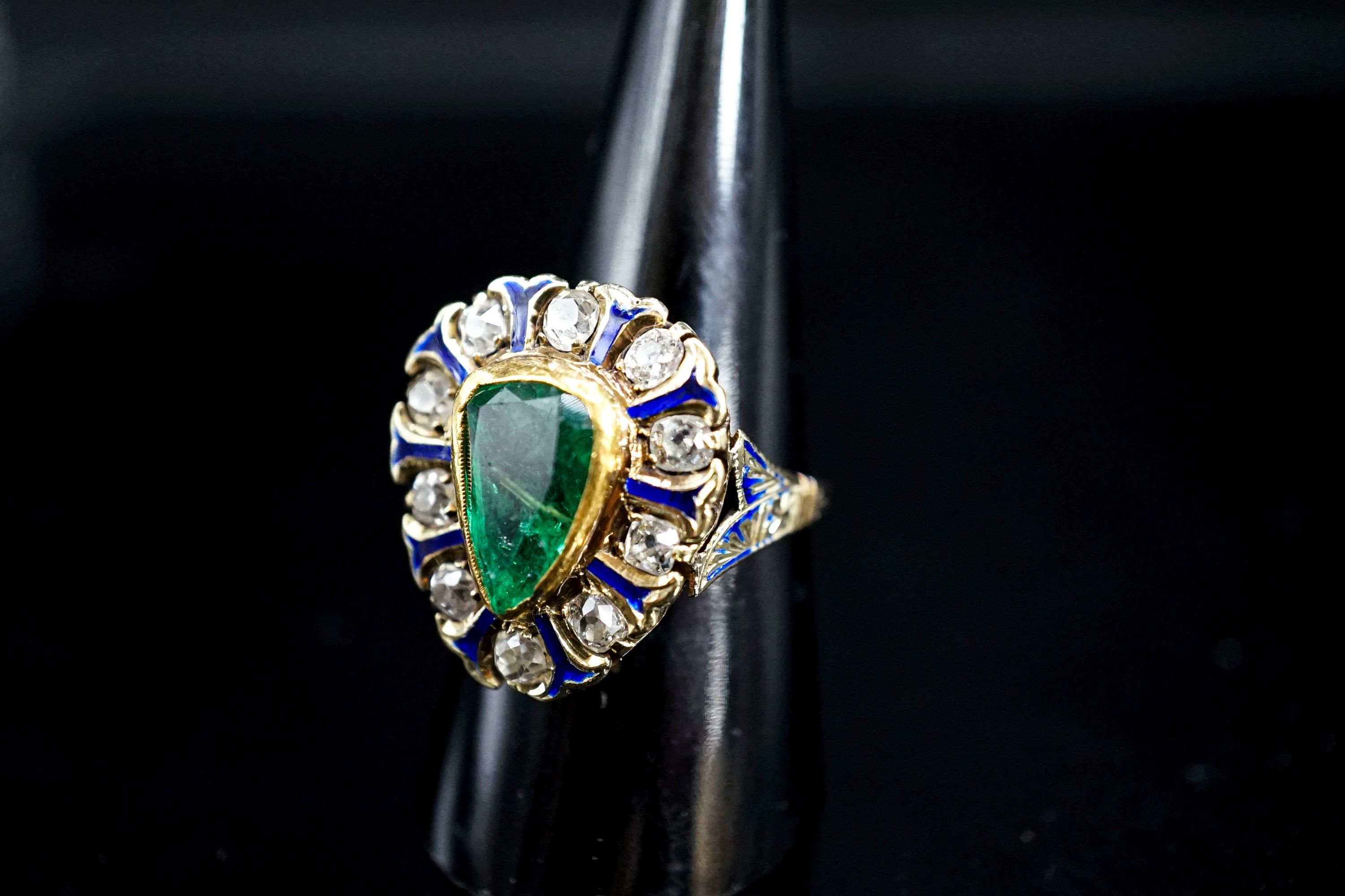 A 14k, emerald, diamond and enamel set pear shaped cluster ring, size Q, gross weight 8.3 grams.